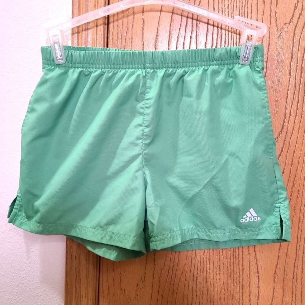Adidas green athletic running shorts
